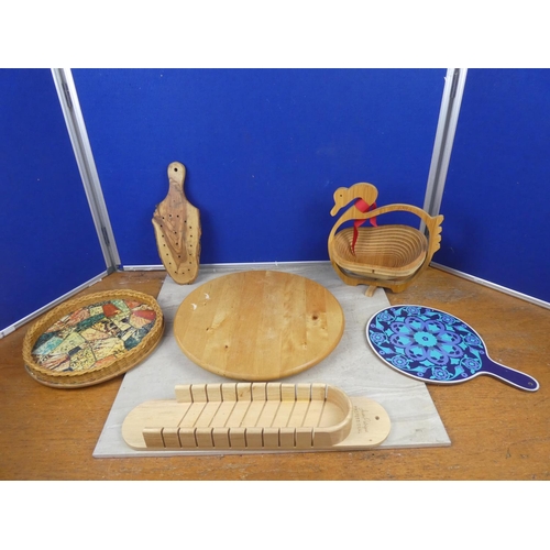 436 - A lot of vintage wooden trays and more.