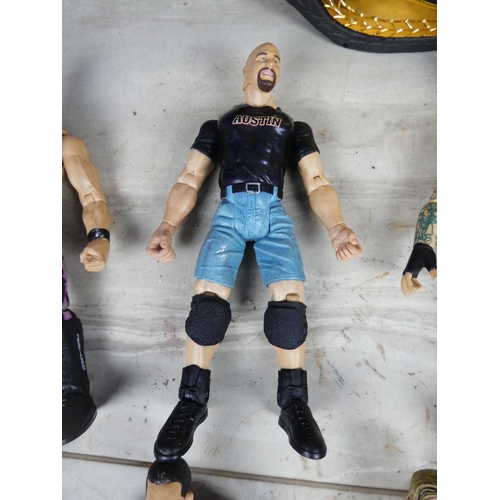 439 - A large lot of WWFE wresting figures and more.