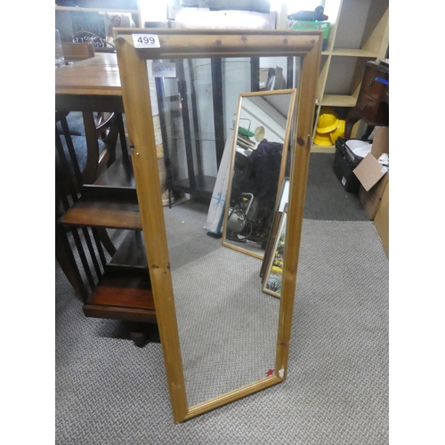 499 - A pine framed mirror.  Approx 38x98cm.