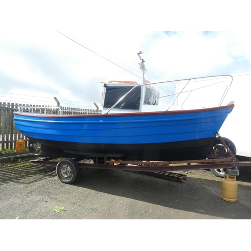 572 - A stunning 19ft fiber glass fishing boat, inboard engine, with cabin and boat trailer. To include a ... 