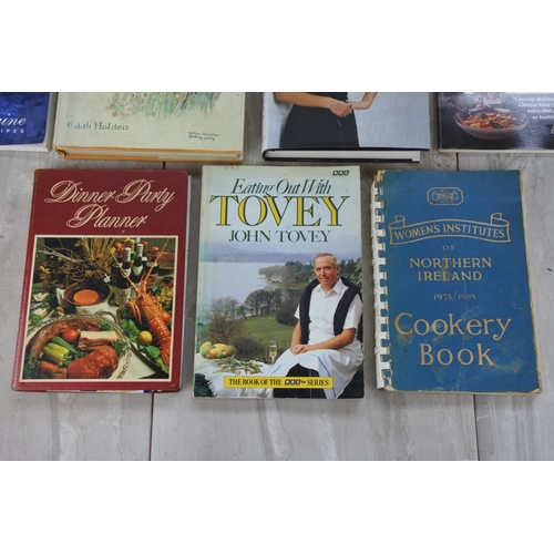 658 - A collection of vintage cookery books and more.