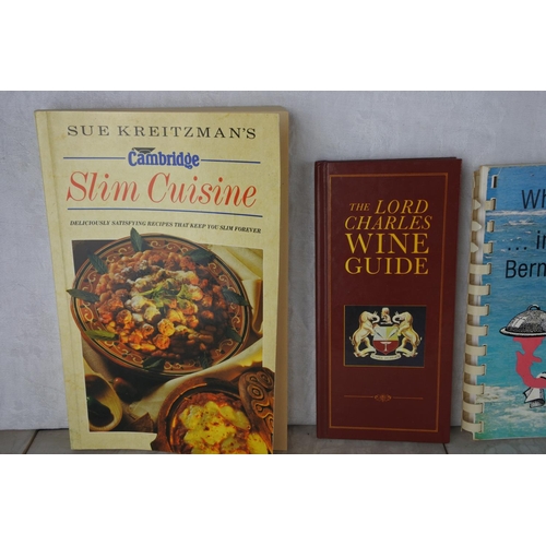 658 - A collection of vintage cookery books and more.