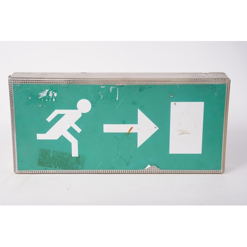 24 - An exit door sign box, measuring 19cm x 41cm x 6cm.