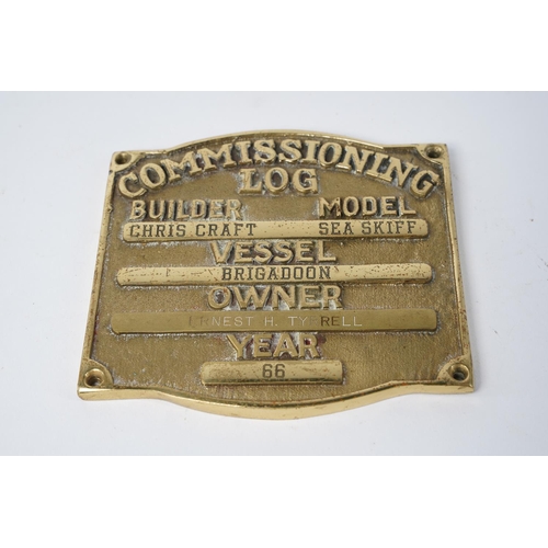 31 - A 'Commissioning Log' brass plaque, measuring 12cm x 13cm.