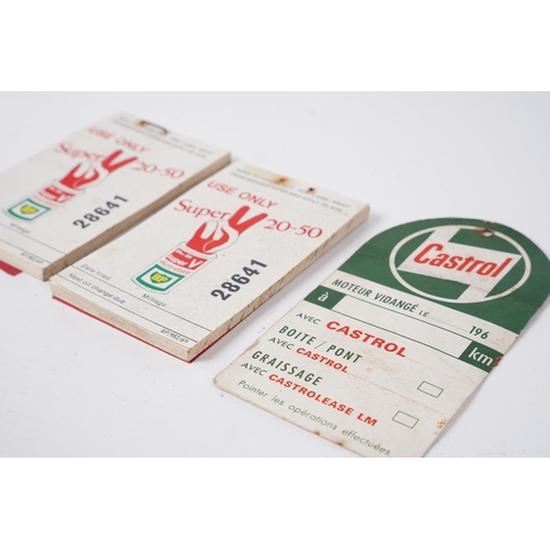 33 - Two vintage BP Super V booklet of stickers and a vintage Castrol cardboard tag.