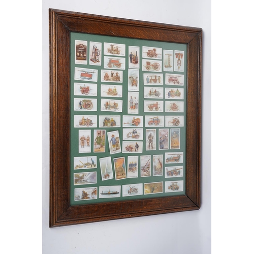 6 - A stunning oak framed picture display of Players Cigarette cards, measuring 61cm x 49cm.