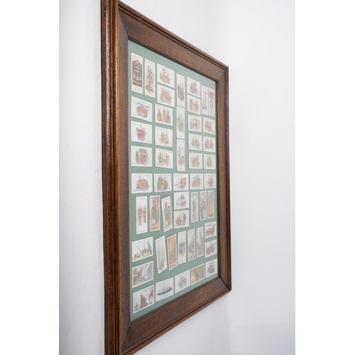 6 - A stunning oak framed picture display of Players Cigarette cards, measuring 61cm x 49cm.