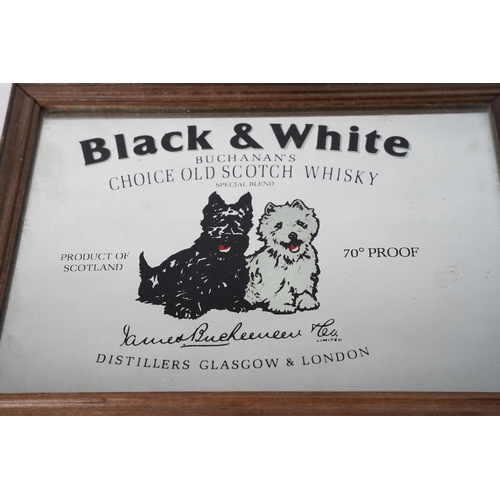 62 - A small framed Black & White Scotch Whisky mirror, measuring 23cm x 17cm.