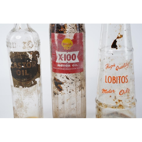 67 - A vintage Castrol Oil bottle with original label, a vintage Lobitos motor oil bottle (a/f) and a vin... 