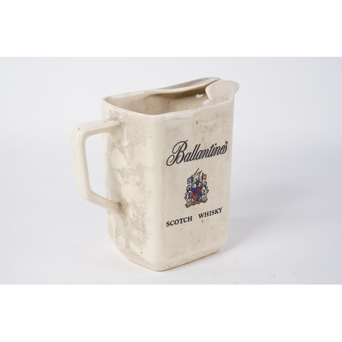 75 - A vintage Wade 'Ballantine Scotch Whisky' pub jug, measuring 14cm.