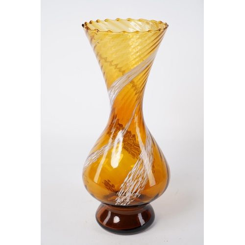 76 - A stunning vintage amber glass vase, with twisted detail, measuring 28cm.