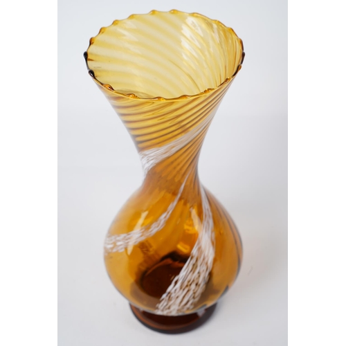 76 - A stunning vintage amber glass vase, with twisted detail, measuring 28cm.