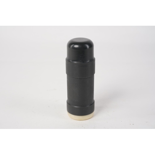 77 - A vintage Police rubber bullet/ baton round, measuring 10cm.