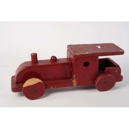 80 - A vintage wooden toy train, measuring 28cm.