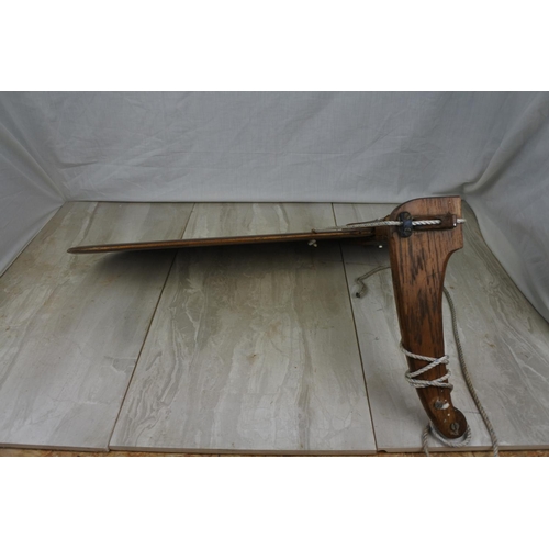 100 - A vintage oak boats rudder, measuring 62cm x 36cm.