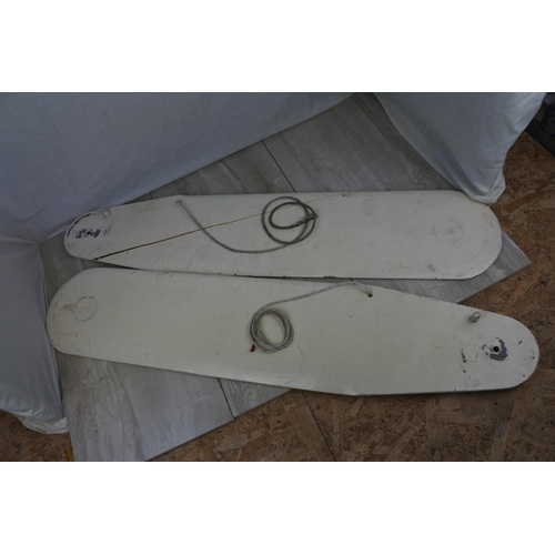 101 - A pair of painted wooden rudders, measuring 96cm x 20cm.