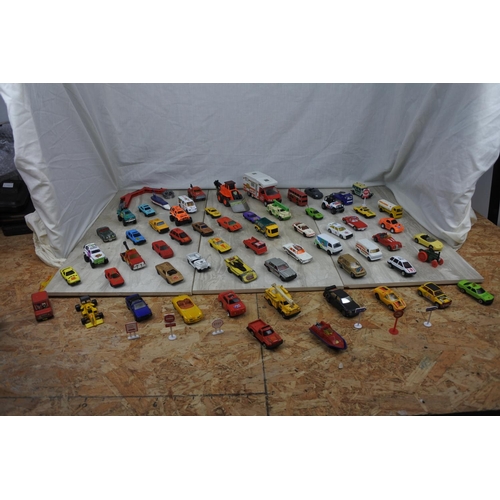 102 - A job lot of assorted Matchbox toy vehicles and more.