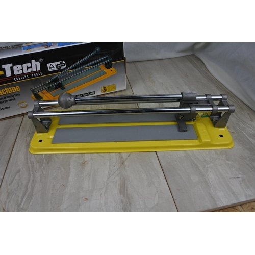 105 - A boxed Am-Tech tile cutting machine.