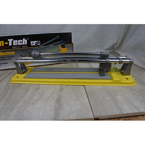 105 - A boxed Am-Tech tile cutting machine.