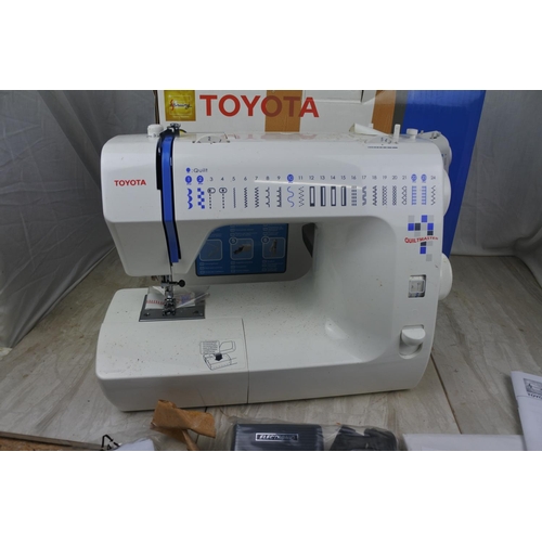 108 - A boxed Toyota Quilt Master sewing machine - untested.