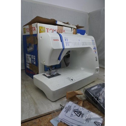 108 - A boxed Toyota Quilt Master sewing machine - untested.