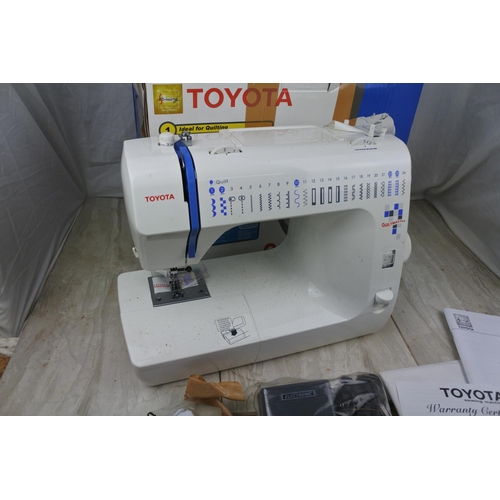 108 - A boxed Toyota Quilt Master sewing machine - untested.