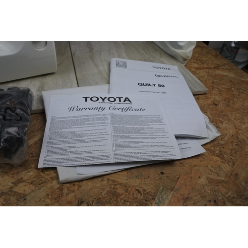 108 - A boxed Toyota Quilt Master sewing machine - untested.