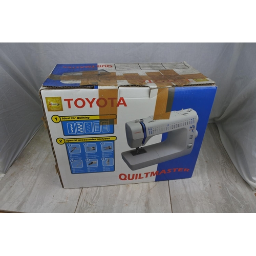 108 - A boxed Toyota Quilt Master sewing machine - untested.