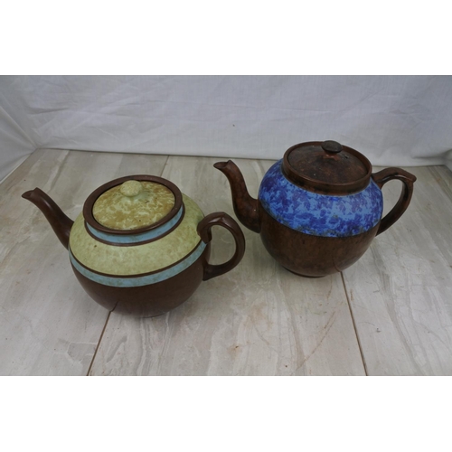 111 - A large vintage Sadler pottery teapot and another.