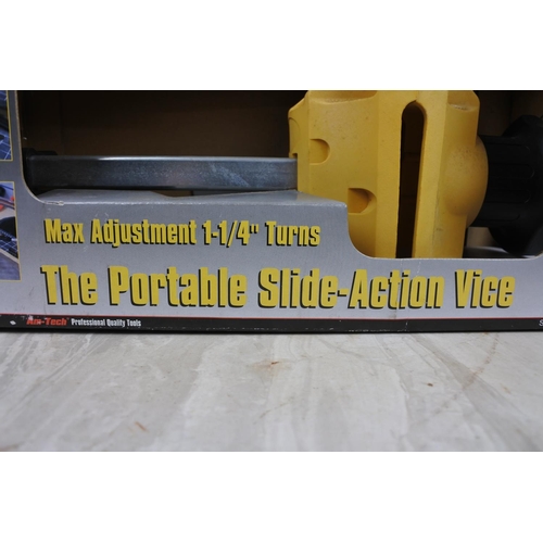 114 - A boxed Am-Tech portable slide action vice.