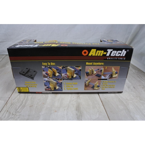 114 - A boxed Am-Tech portable slide action vice.