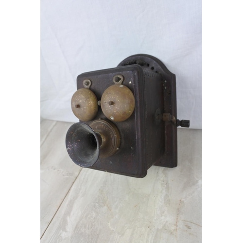 116 - An antique wall mounted telephone base unit, Approx 17x15x17cm.