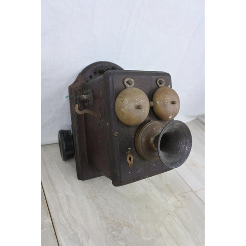 116 - An antique wall mounted telephone base unit, Approx 17x15x17cm.