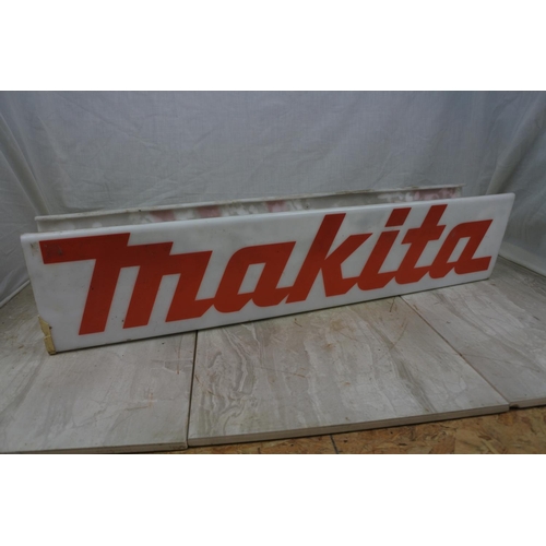 129 - A vintage Makita advertising sign, Approx 66x15x12cm.