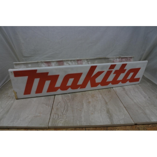 129 - A vintage Makita advertising sign, Approx 66x15x12cm.