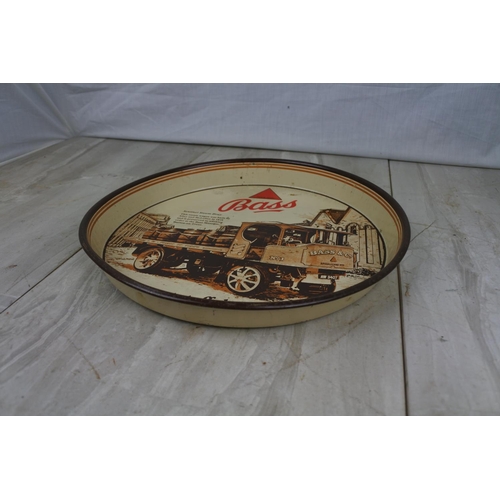 131 - A vintage Bass - Sentinel Steam Dray pub tray, Approx 30cm in diameter.