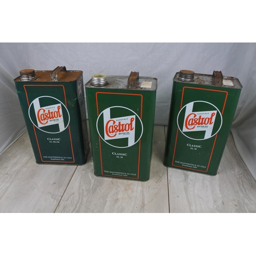 132 - Three Castrol oil cans.