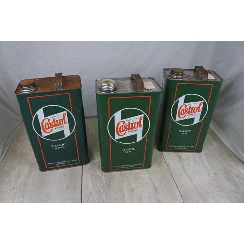 132 - Three Castrol oil cans.