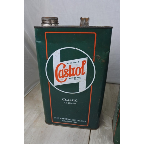 132 - Three Castrol oil cans.