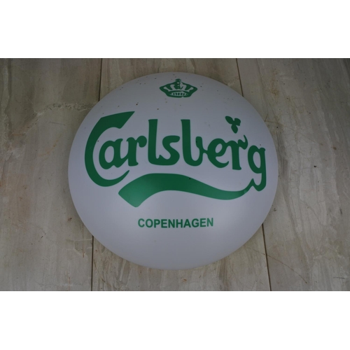 136 - A Carlsberg light cover, Approx 38cm in diameter.