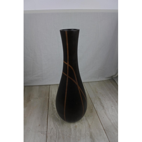 139 - A large decorative wooden vase, Approx 48cm in height.