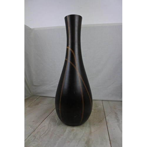 139 - A large decorative wooden vase, Approx 48cm in height.