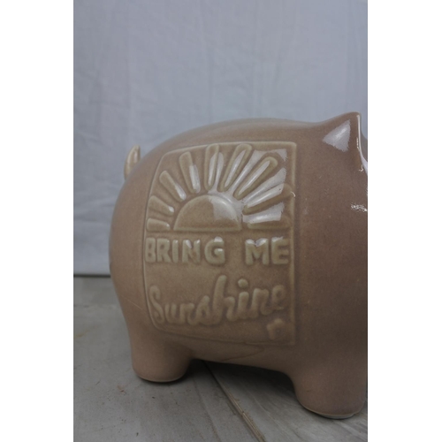 141 - Two 'Bring me Sunshine' ceramic pig money boxes.