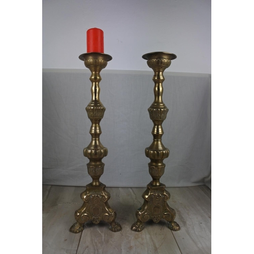 142 - A large pair of antique style ecclesiastical candlesticks, Each Approx 58cm in height.