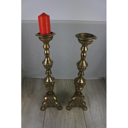 142 - A large pair of antique style ecclesiastical candlesticks, Each Approx 58cm in height.