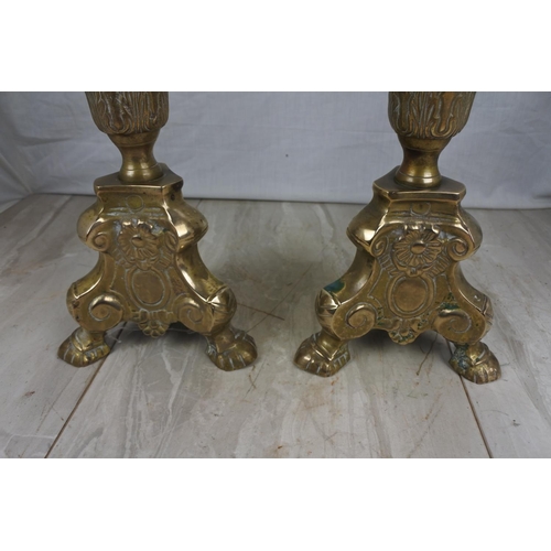 142 - A large pair of antique style ecclesiastical candlesticks, Each Approx 58cm in height.