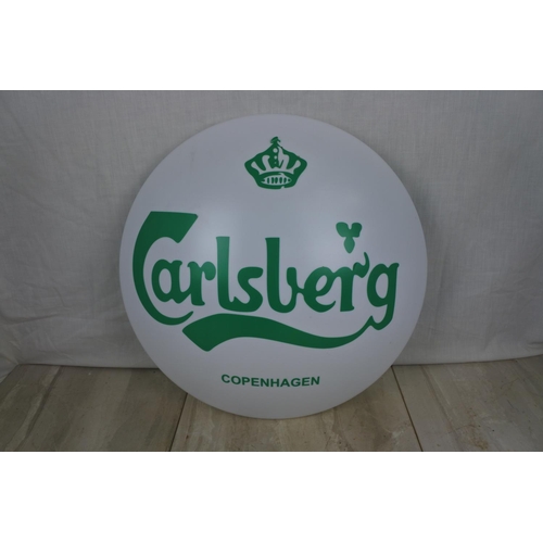 143 - A Carlsberg light cover, Approx 38cm in diameter.