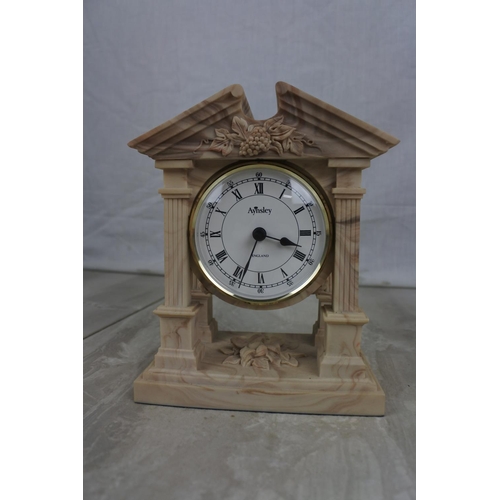 147 - A stunning Aynsley Portlandware mantle clock, Approx 13x16x8cm.