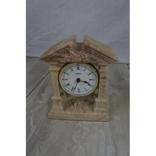 147 - A stunning Aynsley Portlandware mantle clock, Approx 13x16x8cm.