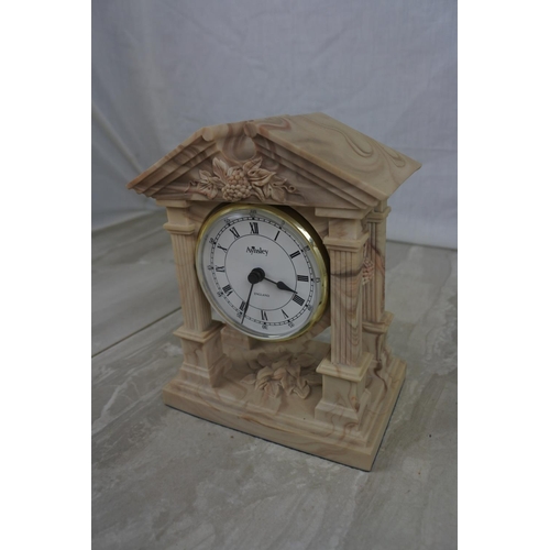 147 - A stunning Aynsley Portlandware mantle clock, Approx 13x16x8cm.